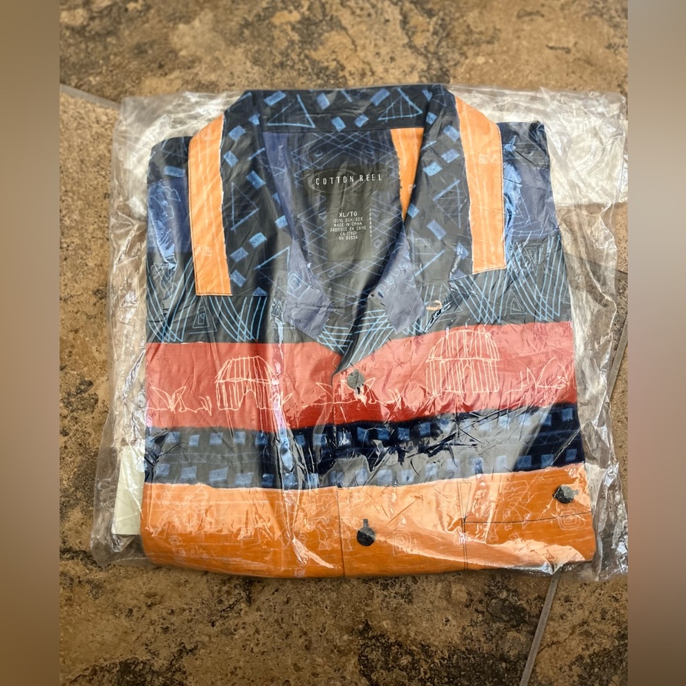 Cotton Reel brand silk short sleeved shirt.
